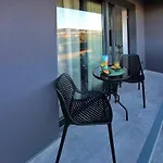 Апартаменты Sunny Oasis